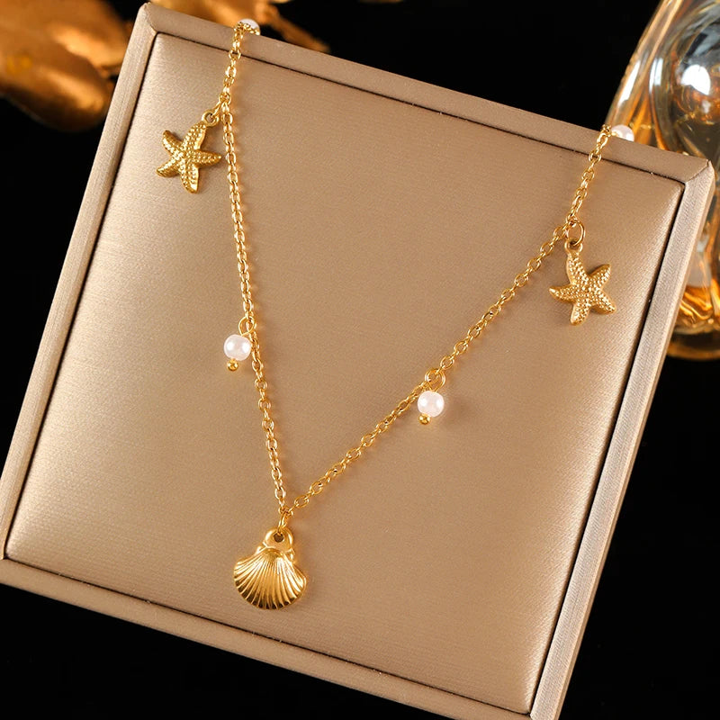 collier dauphin jaune doré