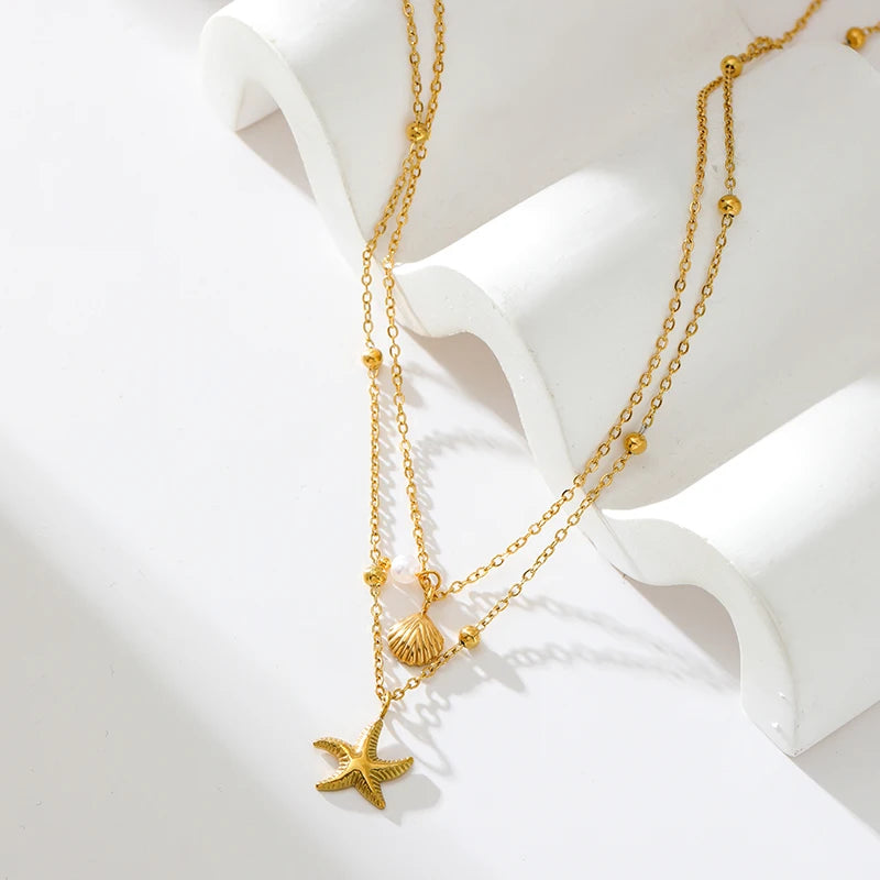 collier dauphin jaune doré