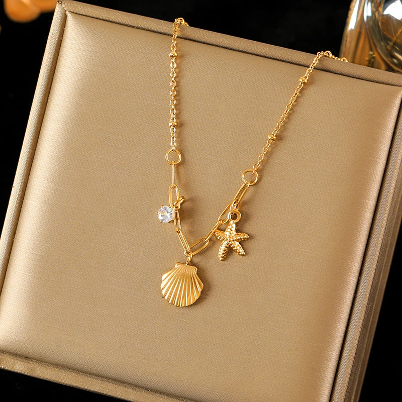 collier dauphin jaune doré