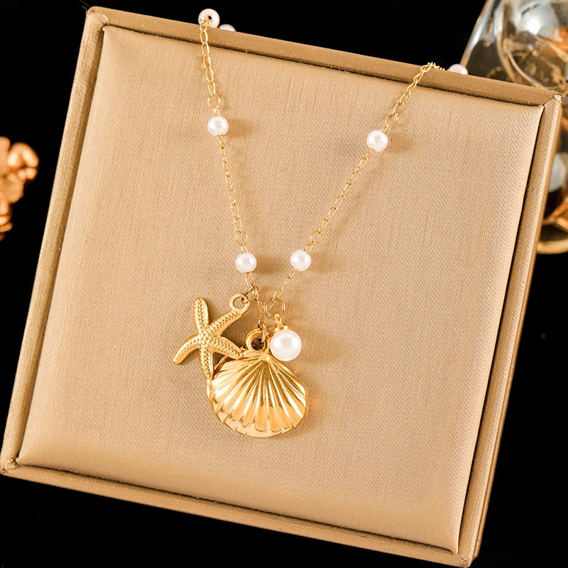 collier dauphin jaune doré