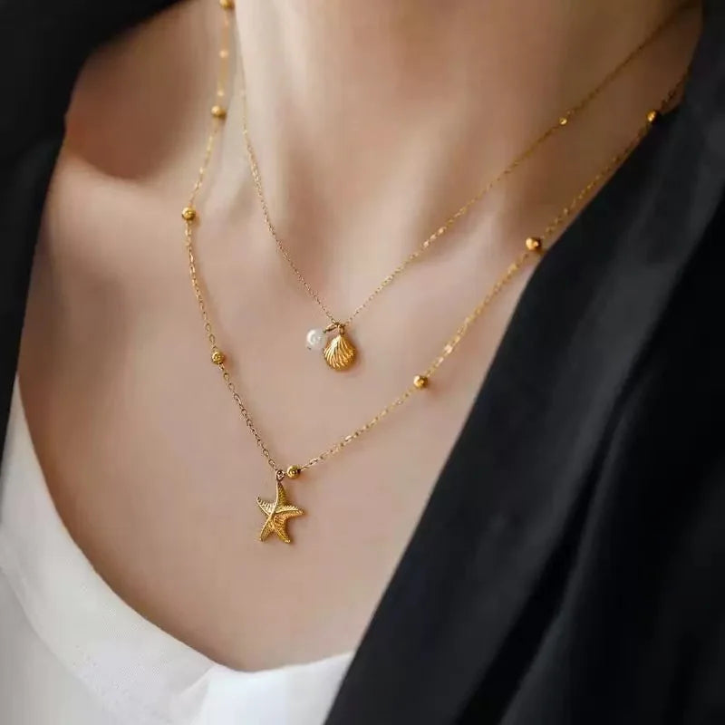 collier dauphin jaune doré