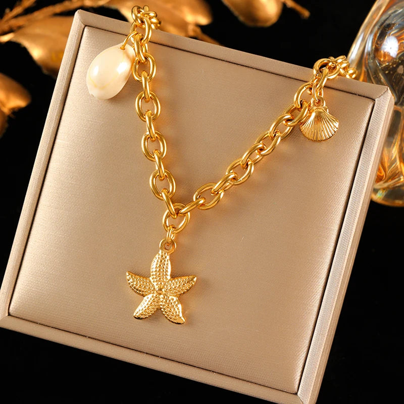 collier dauphin jaune doré