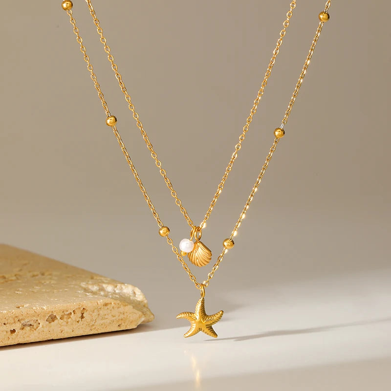 collier dauphin jaune doré