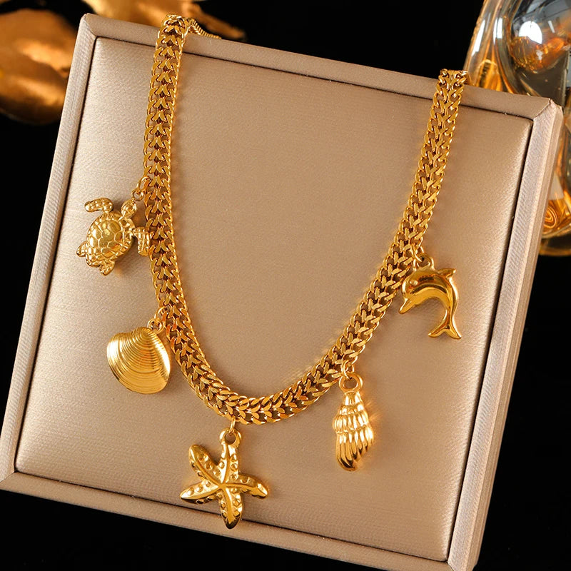 collier dauphin jaune doré