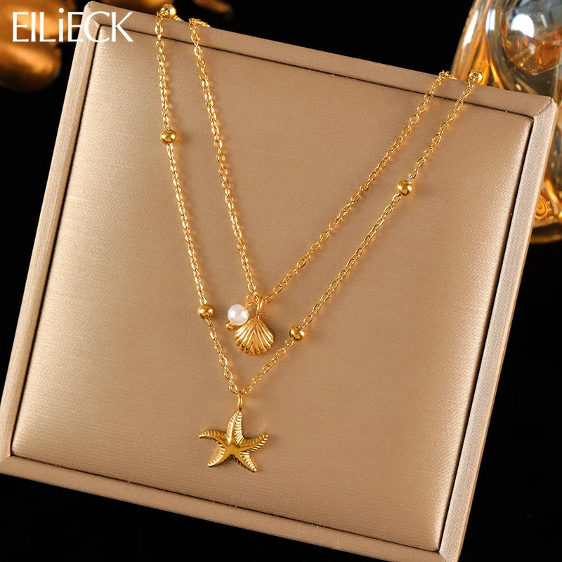 collier dauphin jaune doré