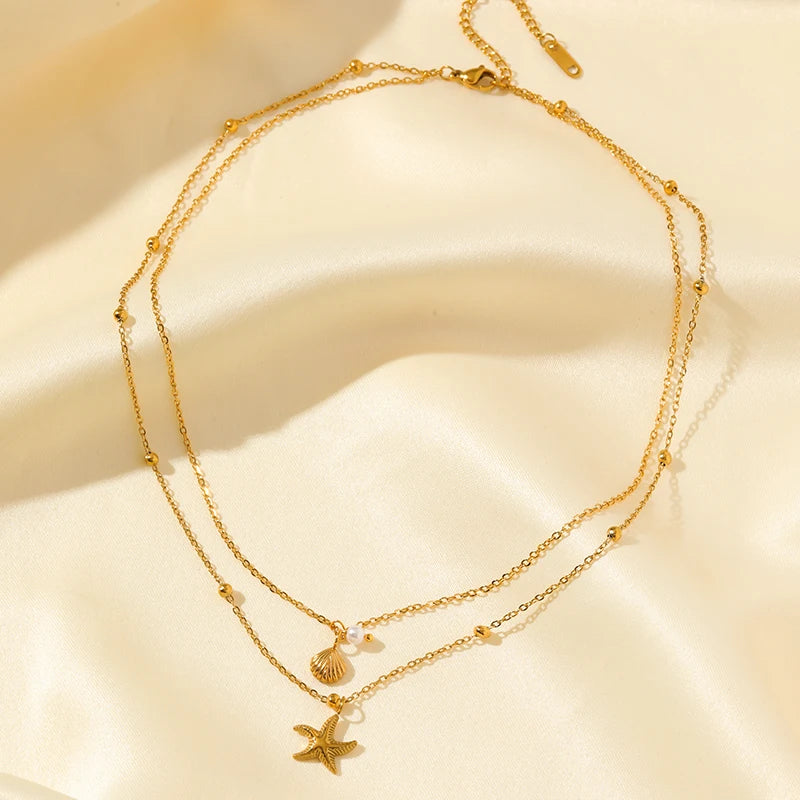 collier dauphin jaune doré