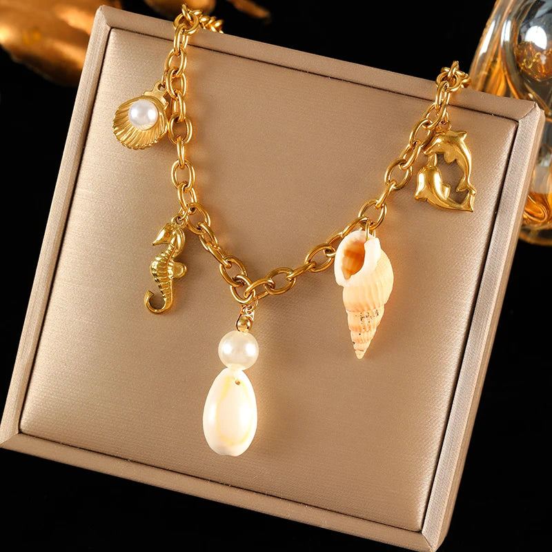 collier dauphin jaune doré