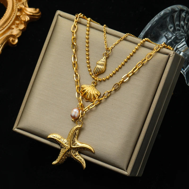 collier dauphin jaune doré