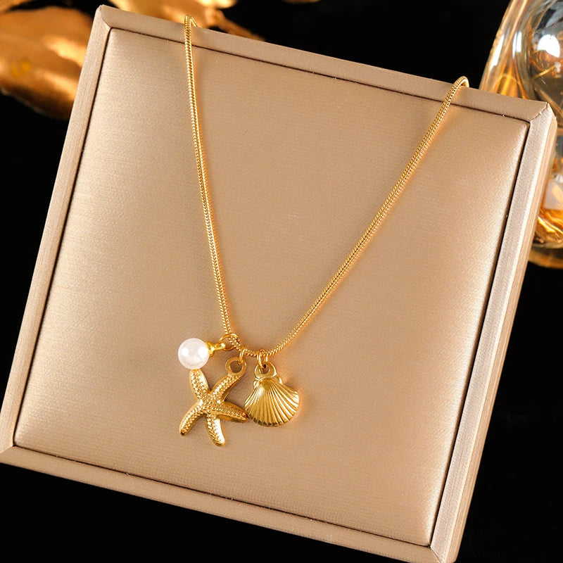 collier dauphin jaune doré